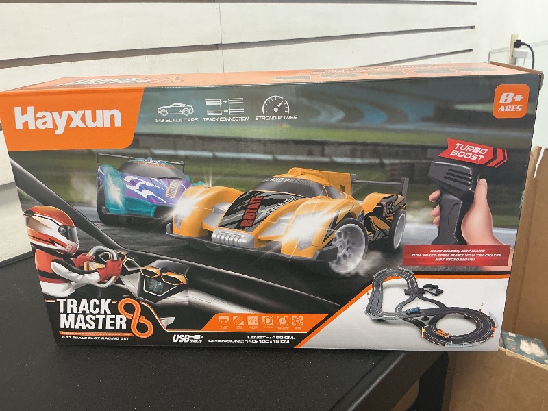 Photo 1 of Electric Slot Car Race Track Sets - Race Car Track Sets with 4 High-Speed Slot Cars 1:43 with Headlights, 2 Hand Controllers, Dual Racing Game Lap Counter, Birthday, Toys for Children