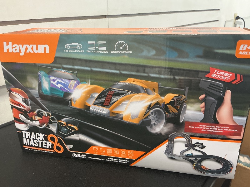 Photo 1 of Electric Slot Car Race Track Sets - Race Car Track Sets with 4 High-Speed Slot Cars 1:43 with Headlights, 2 Hand Controllers, Dual Racing Game Lap Counter, Birthday, Toys for Children