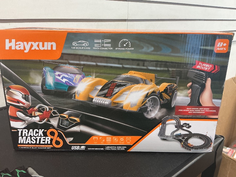 Photo 1 of Electric Slot Car Race Track Sets - Race Car Track Sets with 4 High-Speed Slot Cars 1:43 with Headlights, 2 Hand Controllers, Dual Racing Game Lap Counter, Birthday, Toys for Children