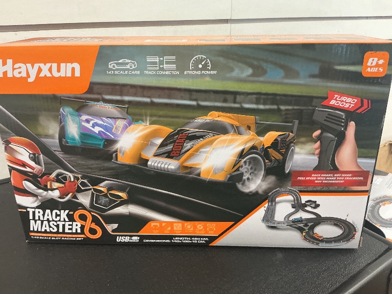 Photo 1 of Electric Slot Car Race Track Sets - Race Car Track Sets with 4 High-Speed Slot Cars 1:43 with Headlights, 2 Hand Controllers, Dual Racing Game Lap Counter, Birthday, Toys for Children