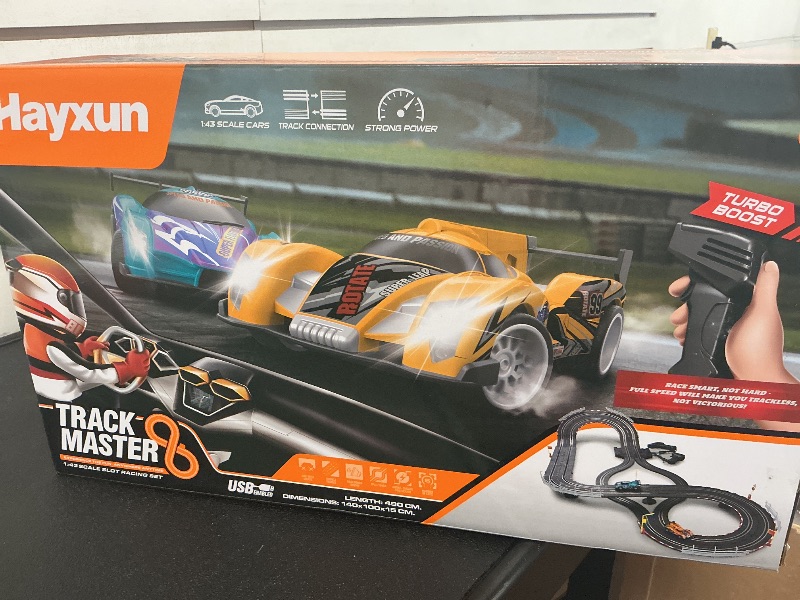 Photo 1 of Electric Slot Car Race Track Sets - Race Car Track Sets with 4 High-Speed Slot Cars 1:43 with Headlights, 2 Hand Controllers, Dual Racing Game Lap Counter, Birthday, Toys for Children