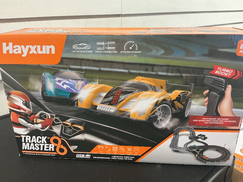 Photo 1 of Electric Slot Car Race Track Sets - Race Car Track Sets with 4 High-Speed Slot Cars 1:43 with Headlights, 2 Hand Controllers, Dual Racing Game Lap Counter, Birthday, Toys for Children