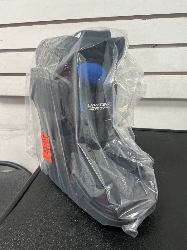 Photo 1 of United Ortho USA14115 Short Air Cam Walker Fracture Boot, Medium, Black