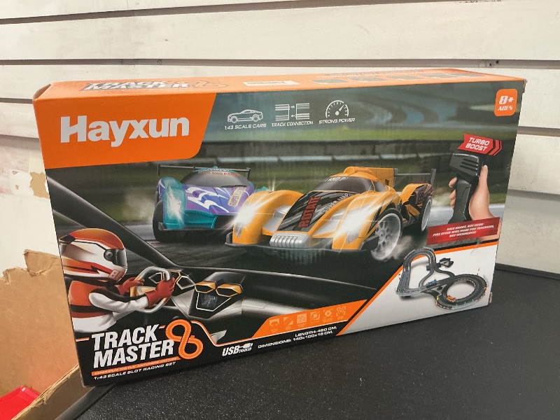 Photo 1 of Electric Slot Car Race Track Sets - Race Car Track Sets with 4 High-Speed Slot Cars 1:43 with Headlights, 2 Hand Controllers, Dual Racing Game Lap Counter, Birthday, Toys for Children