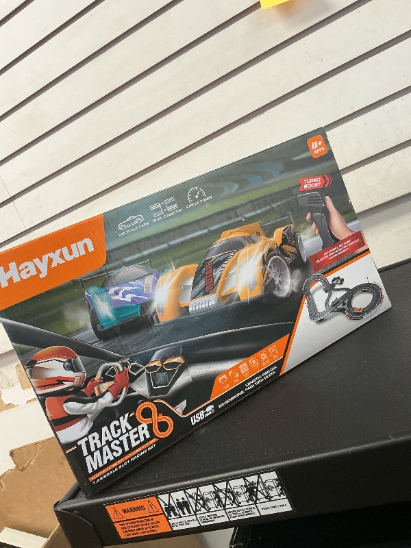 Photo 1 of Electric Slot Car Race Track Sets - Race Car Track Sets with 4 High-Speed Slot Cars 1:43 with Headlights, 2 Hand Controllers, Dual Racing Game Lap Counter, Birthday, Toys for Children