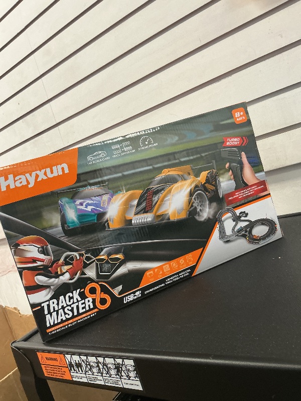Photo 1 of Electric Slot Car Race Track Sets - Race Car Track Sets with 4 High-Speed Slot Cars 1:43 with Headlights, 2 Hand Controllers, Dual Racing Game Lap Counter, Birthday, Toys for Children