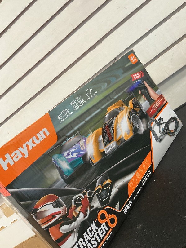 Photo 1 of Electric Slot Car Race Track Sets - Race Car Track Sets with 4 High-Speed Slot Cars 1:43 with Headlights, 2 Hand Controllers, Dual Racing Game Lap Counter, Birthday, Toys for Children