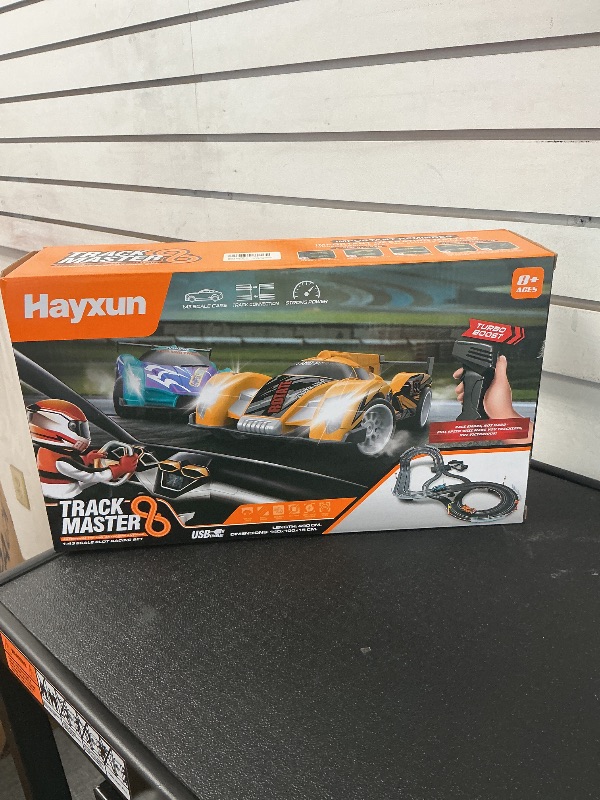 Photo 1 of Electric Slot Car Race Track Sets - Race Car Track Sets with 4 High-Speed Slot Cars 1:43 with Headlights, 2 Hand Controllers, Dual Racing Game Lap Counter, Birthday, Toys for Children