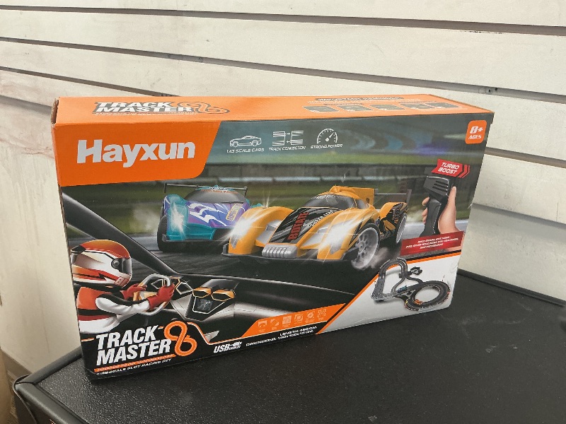 Photo 1 of Electric Slot Car Race Track Sets - Race Car Track Sets with 4 High-Speed Slot Cars 1:43 with Headlights, 2 Hand Controllers, Dual Racing Game Lap Counter, Birthday, Toys for Children