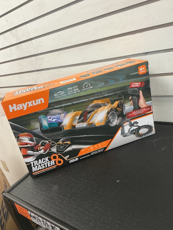 Photo 1 of Electric Slot Car Race Track Sets - Race Car Track Sets with 4 High-Speed Slot Cars 1:43 with Headlights, 2 Hand Controllers, Dual Racing Game Lap Counter, Birthday, Toys for Children