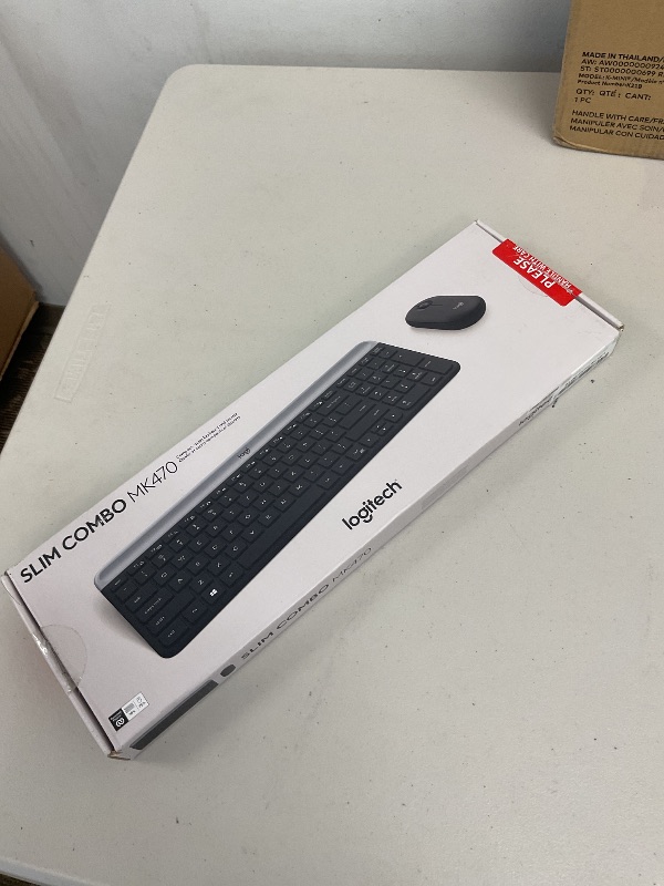 Photo 1 of Logitech MK470 Slim Wireless Keyboard and Mouse Combo - Modern Compact Layout, Ultra Quiet, 2.4 GHz USB Receiver, Plug n' Play Connectivity, Compatible with Windows - Graphite
