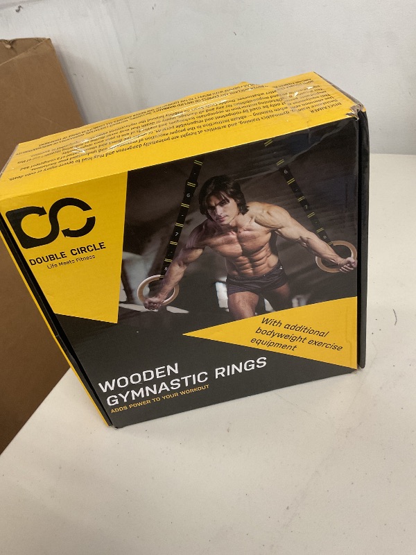 Photo 1 of Double Circle Gymnastics Rings with Quick Adjust Numbered Straps and Exercise Videos Guide - Full Body Gym Rings - Calisthenics Rings Wooden Rings (Rings & Straps + Door Anchor + Foot Straps)