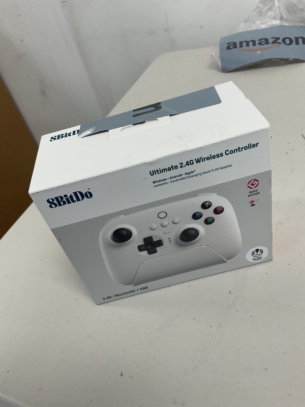 Photo 1 of 8Bitdo Ultimate 2.4g Wireless Controller with Charging Dock, Hall Effect Joystick Update, Pro Gamepad with Back Buttons & Turbo Function for PC, Android, Steam Deck & Apple (White)