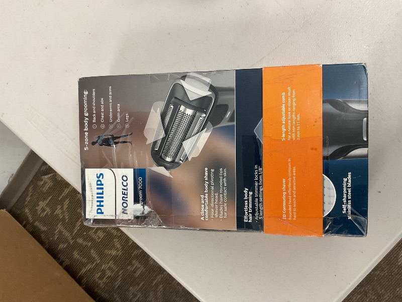 Photo 1 of Philips Norelco Bodygroom 7000 Series, Showerproof Groin and Body Trimmer for Men, Precise Body Grooming, Adjustable Comb, Safe Even Below The Belt, 80 Min. Runtime, Model BG7030/49
