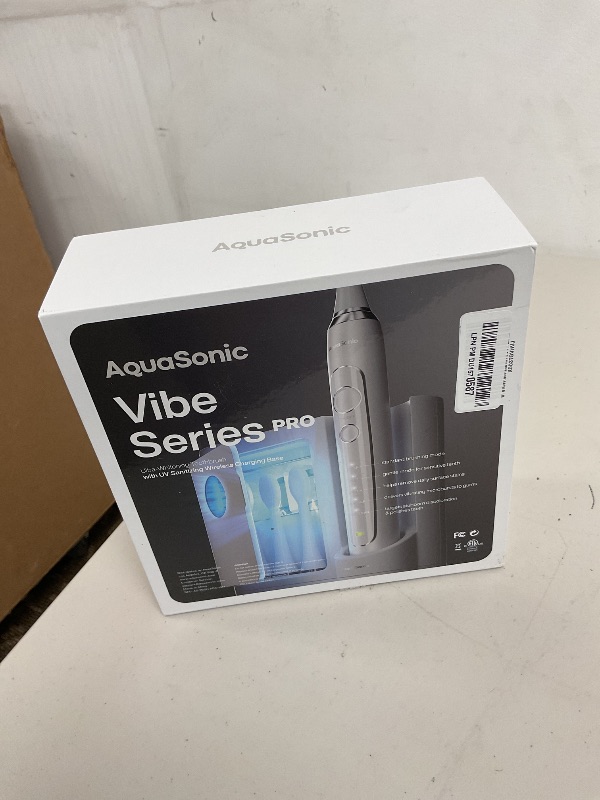 Photo 1 of Aquasonic Vibe Series PRO – Ultra-Whitening Electric Toothbrush – 5 Modes & Smart Timers – UV Sanitizing Base – ADA Accepted (Optic White)