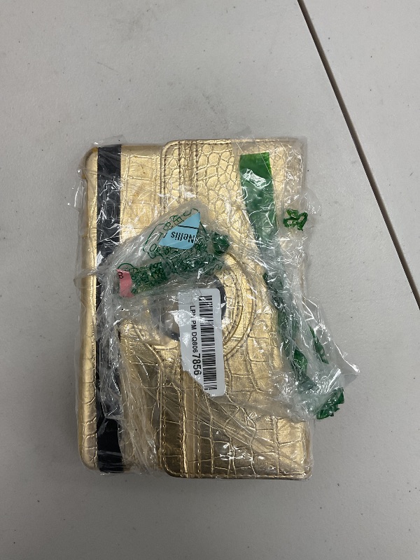 Photo 1 of Crocodile gold case for iPad 