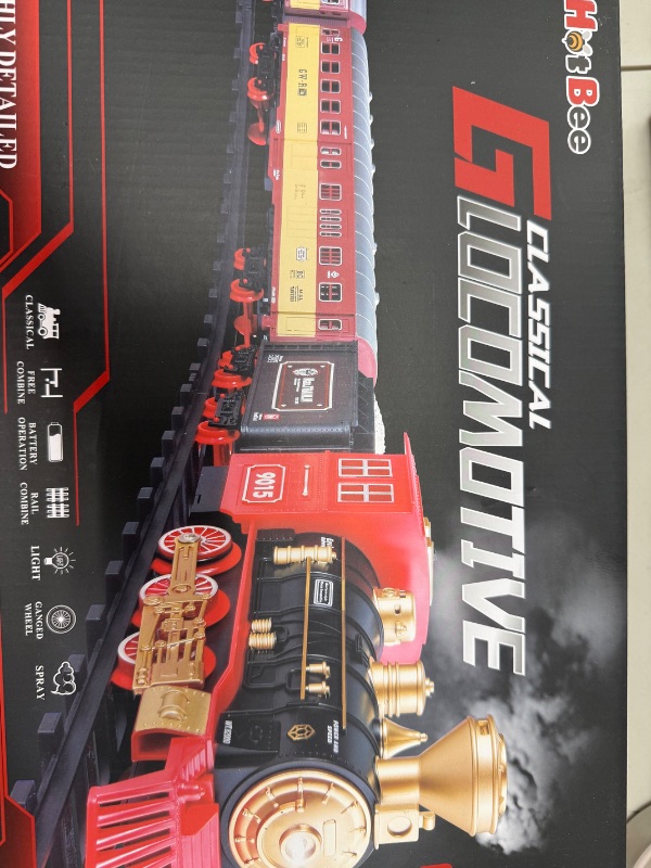 Photo 1 of Hot Bee Christmas Train Set,Train Set for Toddlers 2-4,Christmas Train Sets for Around The Tree,Steam Locomotive with Lights,Sounds,and Spray,Easy Setup Train Toy,Perfect Train Set for Kids Ages 4-8