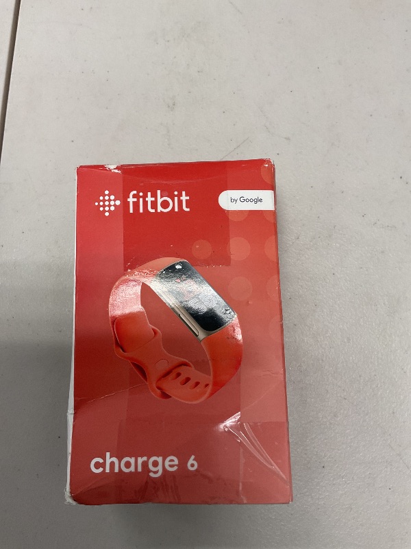 Photo 1 of Fitbit Charge 6 Fitness Tracker with Google apps, Heart Rate on Exercise Equipment, 6-Months Premium Membership Included, GPS, Health Tools and More, Gold/Coral, One Size (S & L Bands Included)
