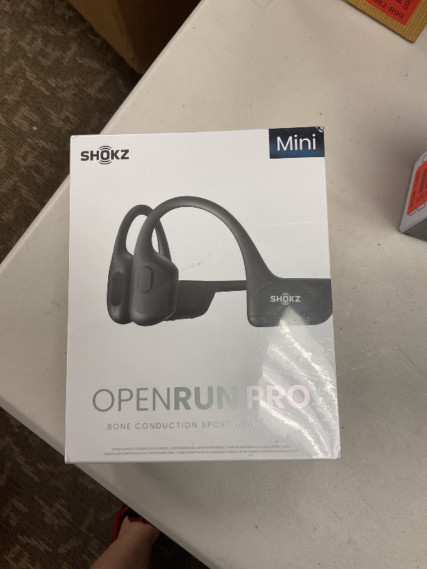 Photo 1 of SHOKZ OpenMove - Open-Ear Bluetooth Sport Headphones, Bone Conduction Wireless Earphones, Sweatproof for Running and Workouts, with Sticker Pack (Pink)