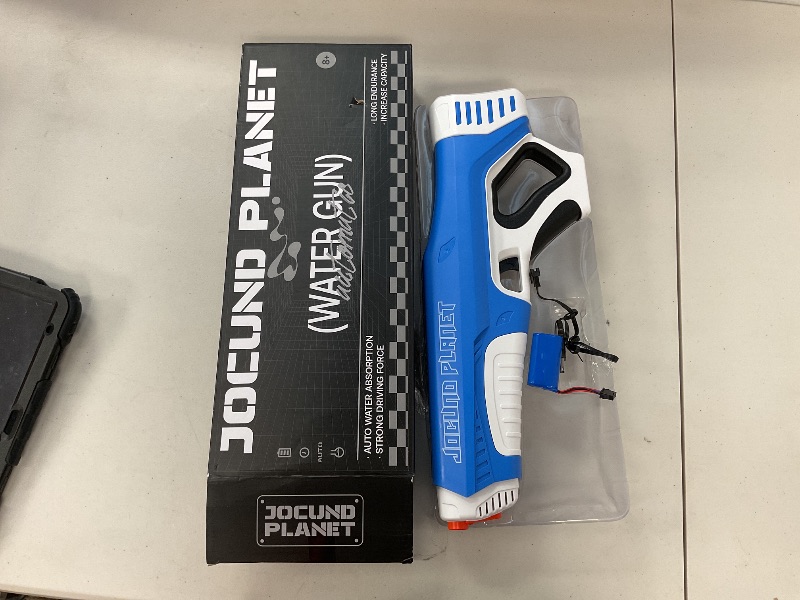 Photo 1 of Electric Water Gun with Automatic Water Absorption, One Reload 300 Water Bullets, Range of 28-32Ft, Waterproof Automatic Reload Water Squirt Gun Toy for Kids (Blue)