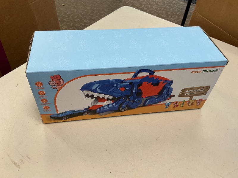 Photo 1 of Dinosaur Planet Toddler Truck Toys for 3 4 5 6 Years Old Boys, Cars Track Set Dinosaur Transporter Truck with 10 Die-Cast Car Toys, Transforms into Dino with Wings and Handle for Kids
