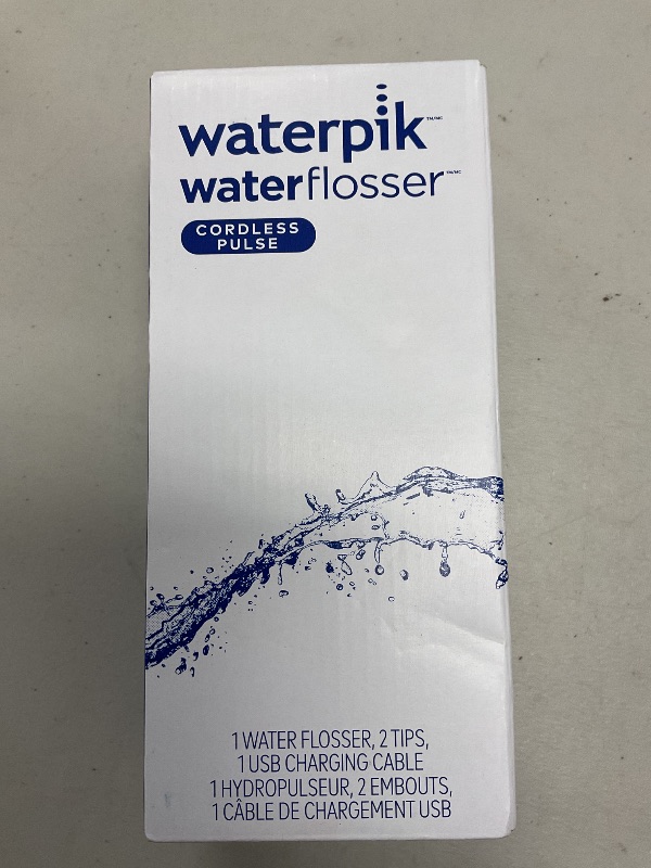 Photo 1 of Waterpik Cordless Pulse Rechargeable Portable Water Flosser for Teeth, Gums, Braces Care and Travel with 2 Flossing Tips, Waterproof, ADA Accepted, WF-20 Blue, Packaging May Vary