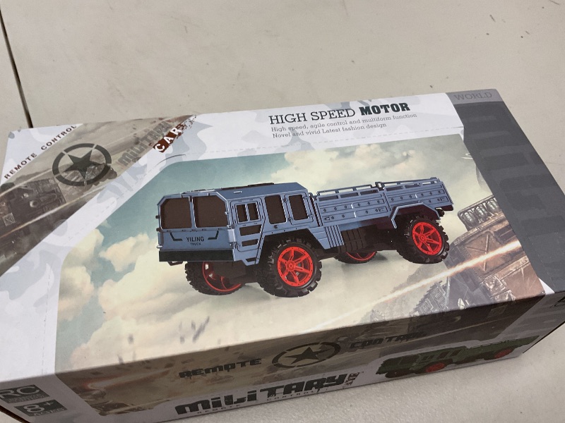 Photo 1 of Puisa Green RC Military Transport Truck, 1:20 Scale Remote Control Battle Vehicle - 2.4GHz, 2 Rechargeable Batteries, Durable All-Terrain Toy for Kids, Boys, and Girls