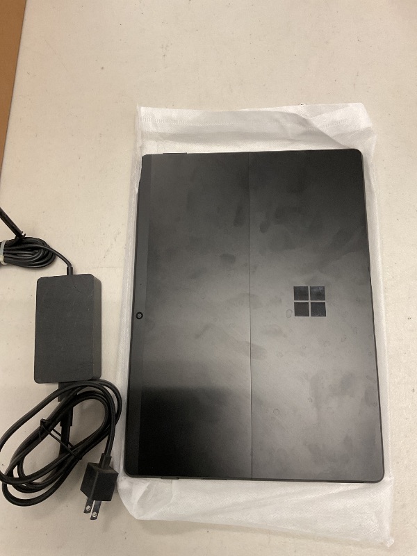 Photo 1 of FOR PARTS ONLY Microsoft Surface Pro X – 13" Touch-Screen – SQ1 - 8GB Memory - 256GB Solid State Drive – Wifi, 4G Lte – Matte Black
