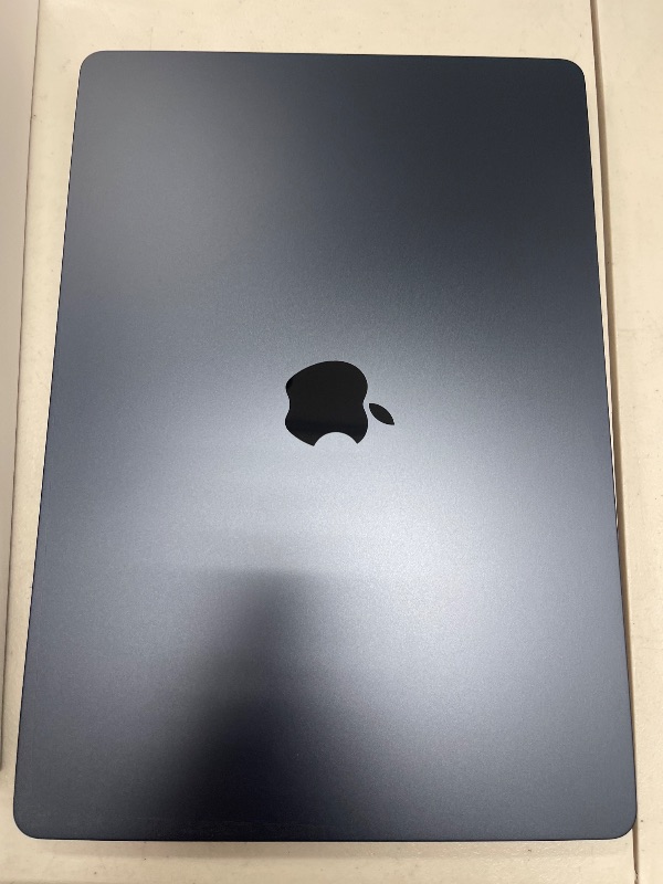 Photo 1 of Apple 2025 MacBook Air 15-inch Laptop with M4 chip: Built for Apple Intelligence, 15.3-inch Liquid Retina Display, 24GB Unified Memory, 512GB SSD Storage, 12MP Center Stage Camera, Touch ID; Midnight