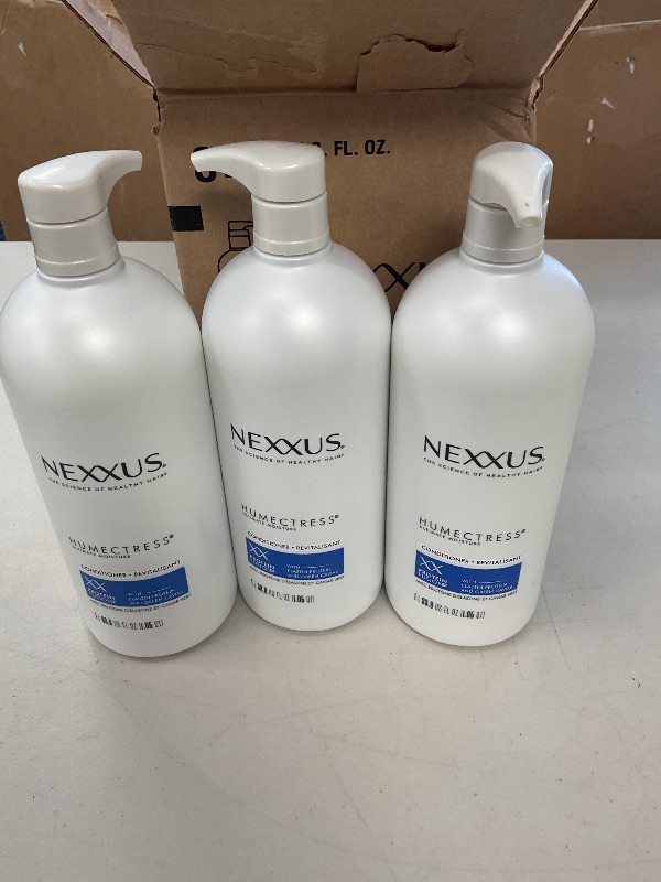Photo 1 of  3 bottles Nexxus Humectress Moisturizing Conditioner Ultimate Moisture for Dry Hair Moisturizing ProteinFusion with Elastin Protein and Green Caviar 33.8 oz