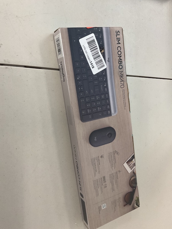 Photo 1 of Logitech MK470 Slim Wireless Keyboard and Mouse Combo - Modern Compact Layout, Ultra Quiet, 2.4 GHz USB Receiver, Plug n' Play Connectivity, Compatible with Windows - Graphite