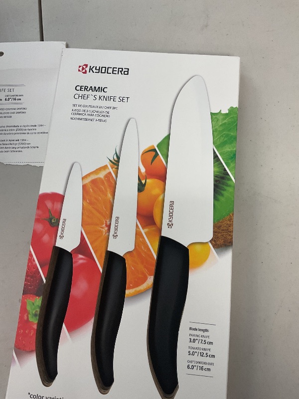 Photo 1 of Kyocera 3-Piece Ceramic Knife Set: Includes 6-inch Chef's Knife, 5-inch Micro Serrated Knife, and 3-inch Paring Knife - Red Handles with White Blades