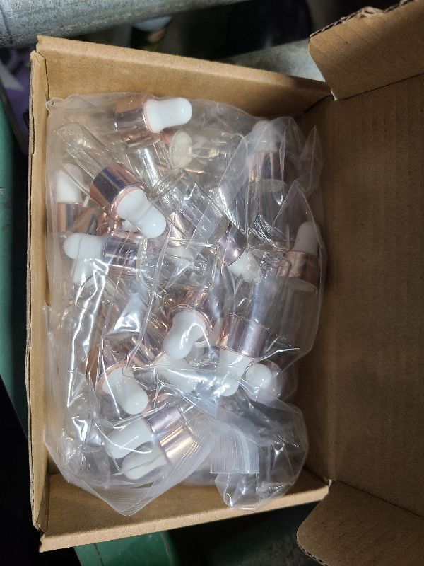 Photo 1 of 30 Pcs Clear Glass Dropper Bottles Essential Oil Sample Bottles Perfume Vials Liquid Cosmetic Containers Glass Eye Dropper Bottles With Rose Gold Lids (3ml)