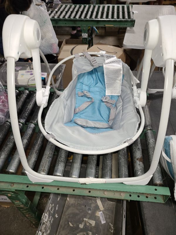 Photo 1 of  Swingity Swing Easy-Fold Portable Baby Swing, 0-9 Months Up to 20 lbs