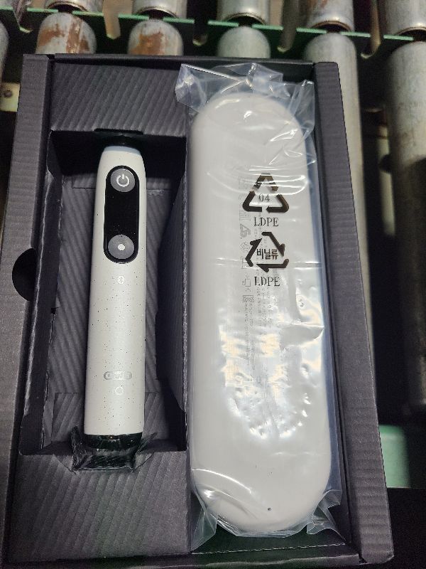 Photo 1 of Oral-B iO Series 10 Rechargeable Electric Toothbrush with Visible Pressure Sensor to Protect Gums, 2 Min Timer, 7 Cleaning Settings, 4 Replacement Toothbrush Heads, and Charging Travel Case, White