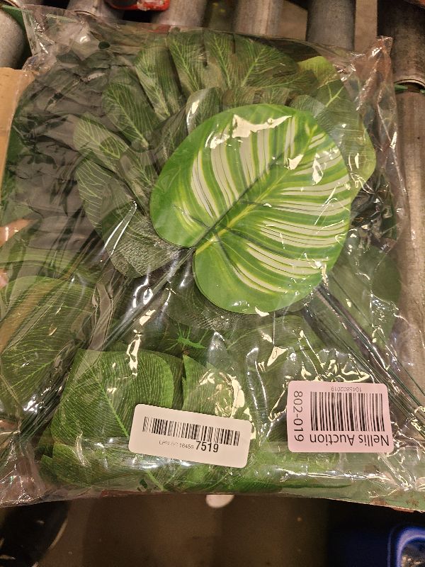 Photo 1 of 106Pieces 10 Kinds Artificial Palm Leaves Tropical Leaves with Stems Jungle Leaves Decorations for Hawaiian Luau Party Beach Baby Shower Wedding Birthday