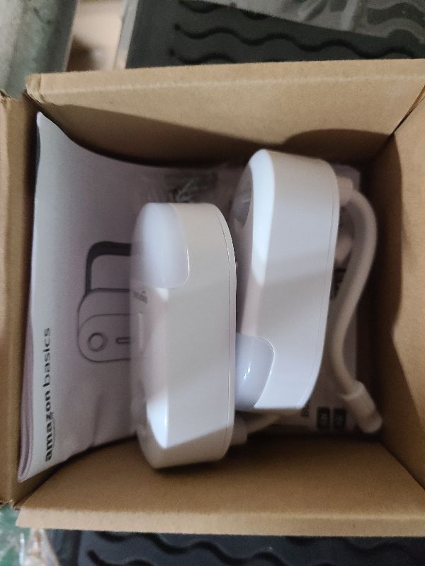 Photo 1 of Amazon Basics Color Changing LED Toilet Bowl Motion Sensor Light, Battery Operated, 2 Pack, White