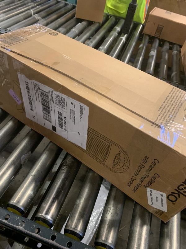 Photo 1 of Lasko 1500W Ceramic Tower Space Heater with Remote, Thermostat, Timer & Widespread Oscillation, Portable Electric Heater for Indoor Use, Bedroom & Living Room, 751320