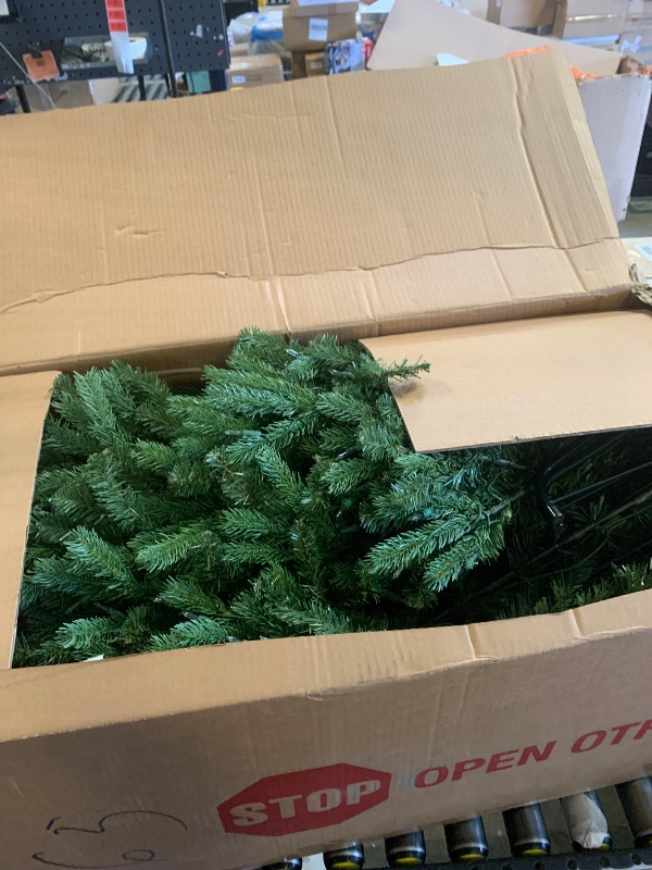 Photo 1 of National Tree Company 7.5 ft Pre-Lit Jersey Fraser Fir Artificial Christmas Tree, 1,250 Clear Lights, 3,144 Tips, Includes Stand, Green