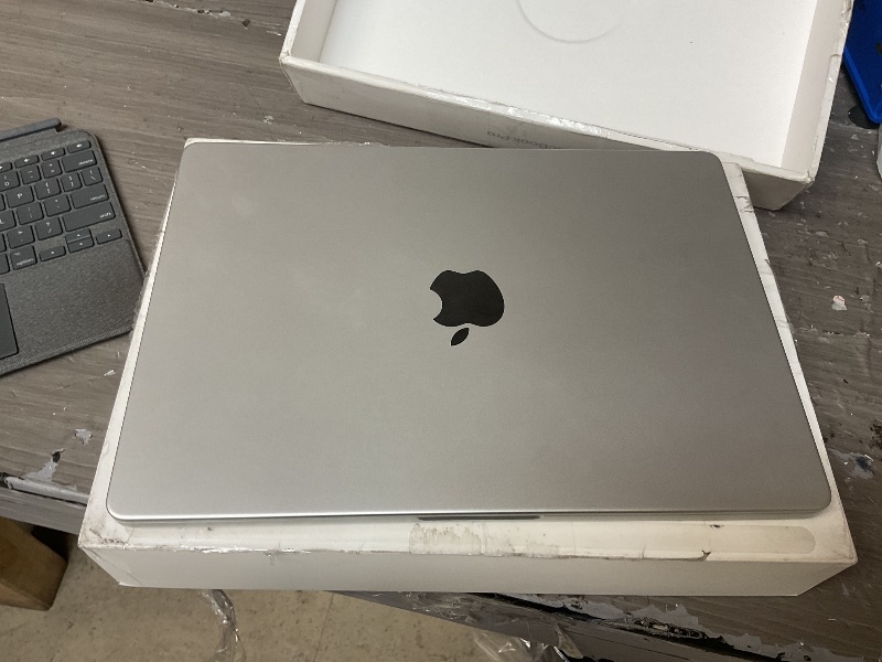 Photo 1 of LOCKED….SEE CLERK NOTES********** Apple 2024 MacBook Pro Laptop with M4 Pro, 12?core CPU, 16?core GPU: Built for Apple Intelligence, 14.2-inch Liquid Retina XDR Display, 24GB Unified Memory, 512GB SSD Storage; Silver