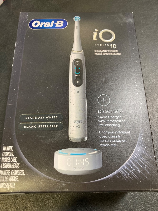 Photo 1 of Oral-B iO Series 10 Rechargeable Electric Toothbrush with Visible Pressure Sensor to Protect Gums, 2 Min Timer, 7 Cleaning Settings, 4 Replacement Toothbrush Heads, and Charging Travel Case, White