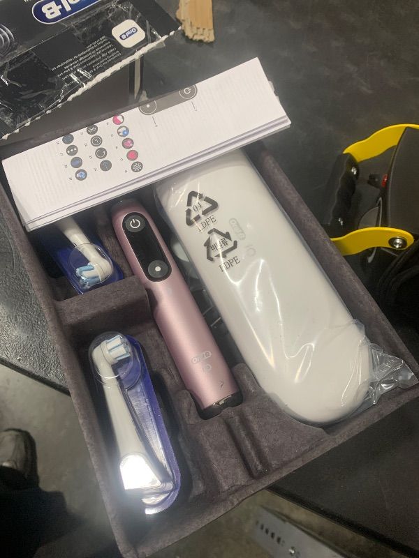 Photo 1 of Oral-B iO Series 9 Limited Rechargeable Rose Quartz Electric Toothbrush with (2) Ultimate Clean and (1) Gentle Care Replacement Brush Heads, White, Travel Case-White and Charger