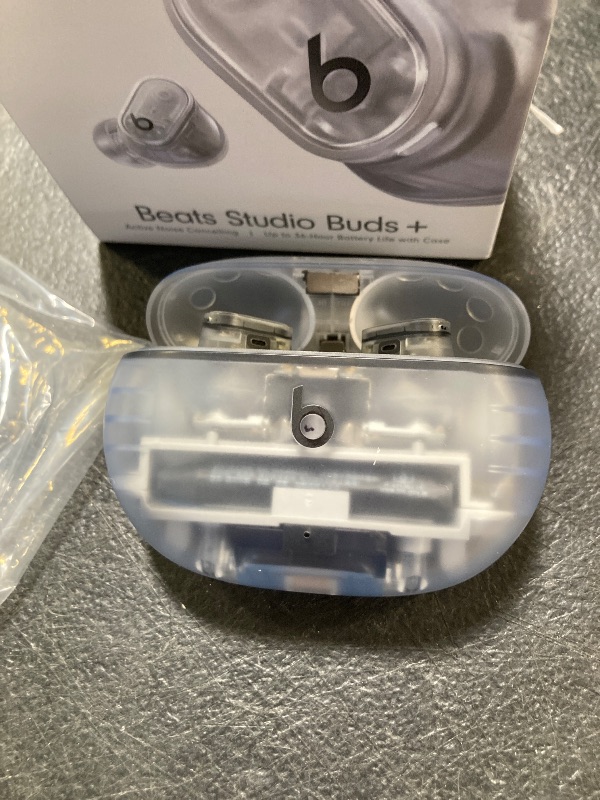 Photo 1 of Beats Studio Buds + | True Wireless Noise Cancelling Earbuds, Enhanced Apple & Android Compatibility, Built-in Microphone, Sweat Resistant Bluetooth Headphones, Spatial Audio - Transparent