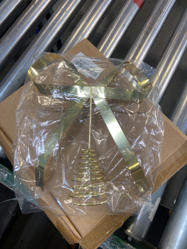 Photo 1 of HMASYO Christmas Tree Topper Bow, 10.5 Inch Large Gold Metal Bow Tree Topper with Spiral Base for Holiday Xmas Party Christmas Tree Top Decorations (Gold)