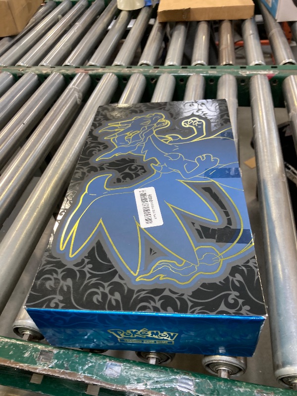 Photo 1 of BOX IS USED AND PACKS HAVE BEEN OPENED. MISSING ITEMS -----------------------------------------------------------------------------------------Pokémon TCG: Mega Charizard X ex Ultra-Premium Collection