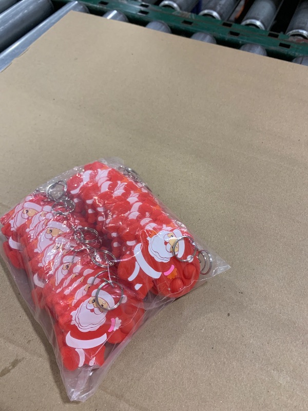 Photo 1 of HOZKEAP 24 Packs Bulk Mini pop Santa Cartoon Shape fidget Bubble key chain, Boys and Girls Christmas Party Favors Student Gifts