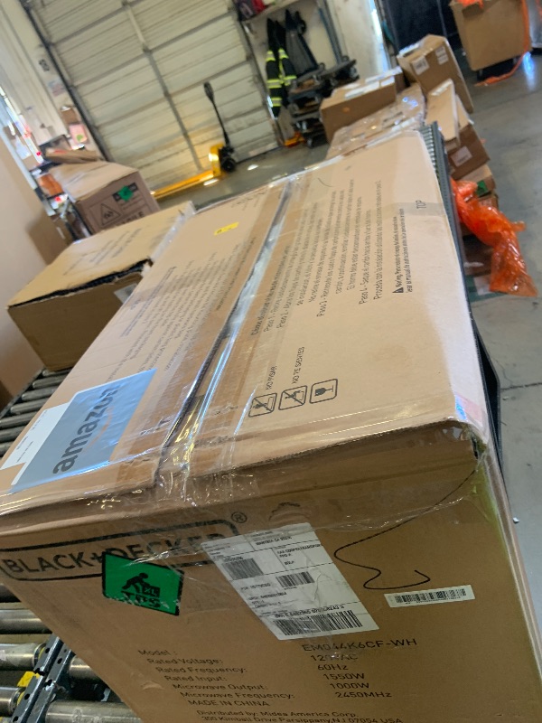 Photo 1 of BLACK+DECKER Over the Range Microwave Oven with Vent and One-Touch Auto Cooking, 1.7 cu. ft. OTR Over Stove Microwave, White, 1000 Watts, EM044K6CF-WH