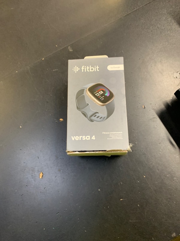 Photo 1 of Fitbit Versa 4 Fitness Smartwatch with Daily Readiness, GPS, 24/7 Heart Rate, 40+ Exercise Modes, Sleep Tracking and more, Waterfall Blue/Platinum, One Size (S & L Bands Included)