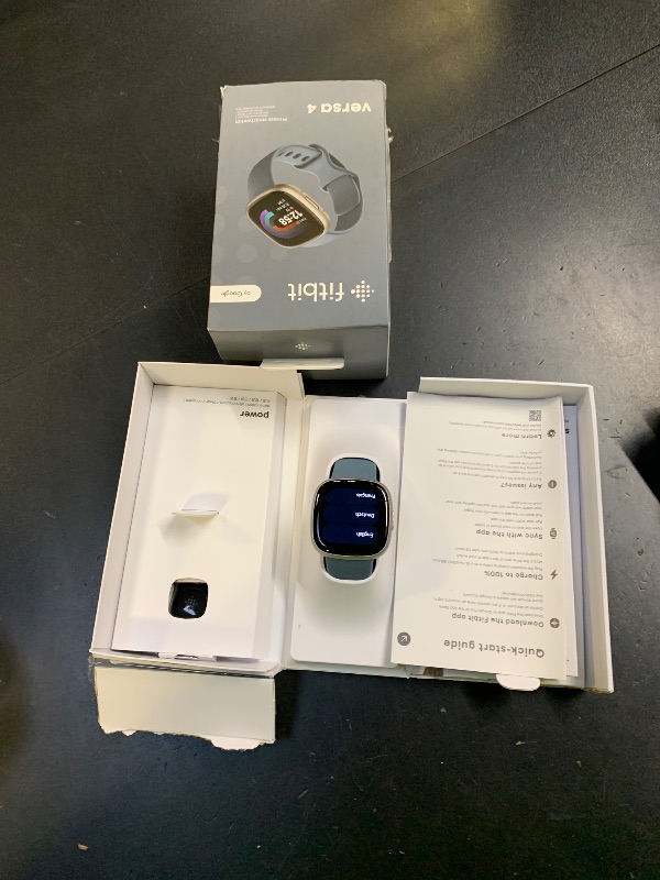 Photo 1 of Fitbit Versa 4 Fitness Smartwatch with Daily Readiness, GPS, 24/7 Heart Rate, 40+ Exercise Modes, Sleep Tracking and more, Waterfall Blue/Platinum, One Size (S & L Bands Included)
