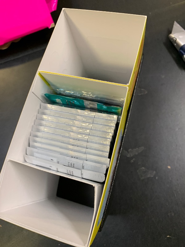 Photo 1 of opened----------------------------Magic: The Gathering - Final Fantasy Chocobo Bundle (1 Chocobo Booster, 10 Play Boosters, 1 Alt-Art Promo Card, 1 Scene Card, 32 Basic Lands, 1 Click Wheel, and More)